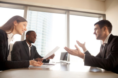 interviewers listening to candidate