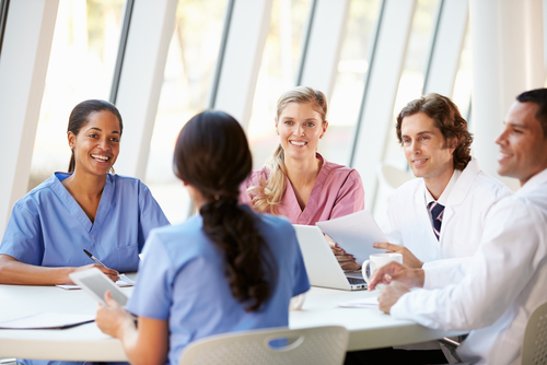 nurse speaking in group